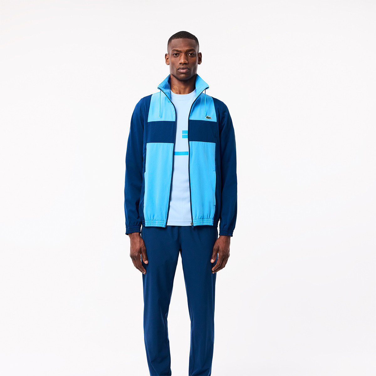 LACOSTE DJOKOVIC NEW YORK TRAININGSPAK LACOSTE Heren Kleding Tennispro